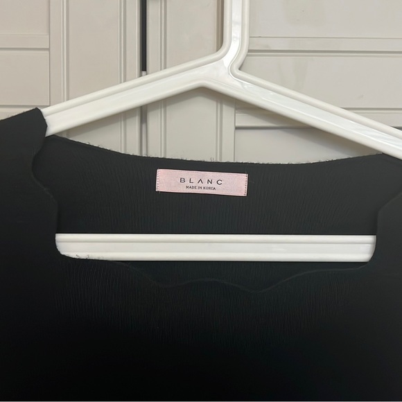 Black soft sweater made in Korea. Cute neck and cuff design. - Picture 3 of 6